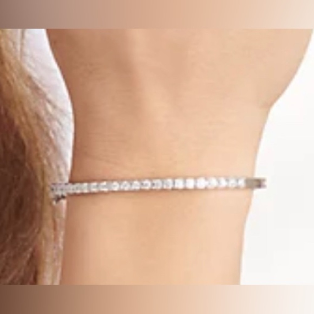 Diamonique bangle in sterling silver.